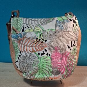 SAKROOTS Arist Circle Crossbody Bag - Vibrant Animal And Left Print NWOT